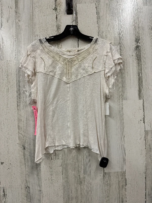 women's tops for those who want to wear pieces that are both comfortable and stylishCream Top Short Sleeve Free People, Size L